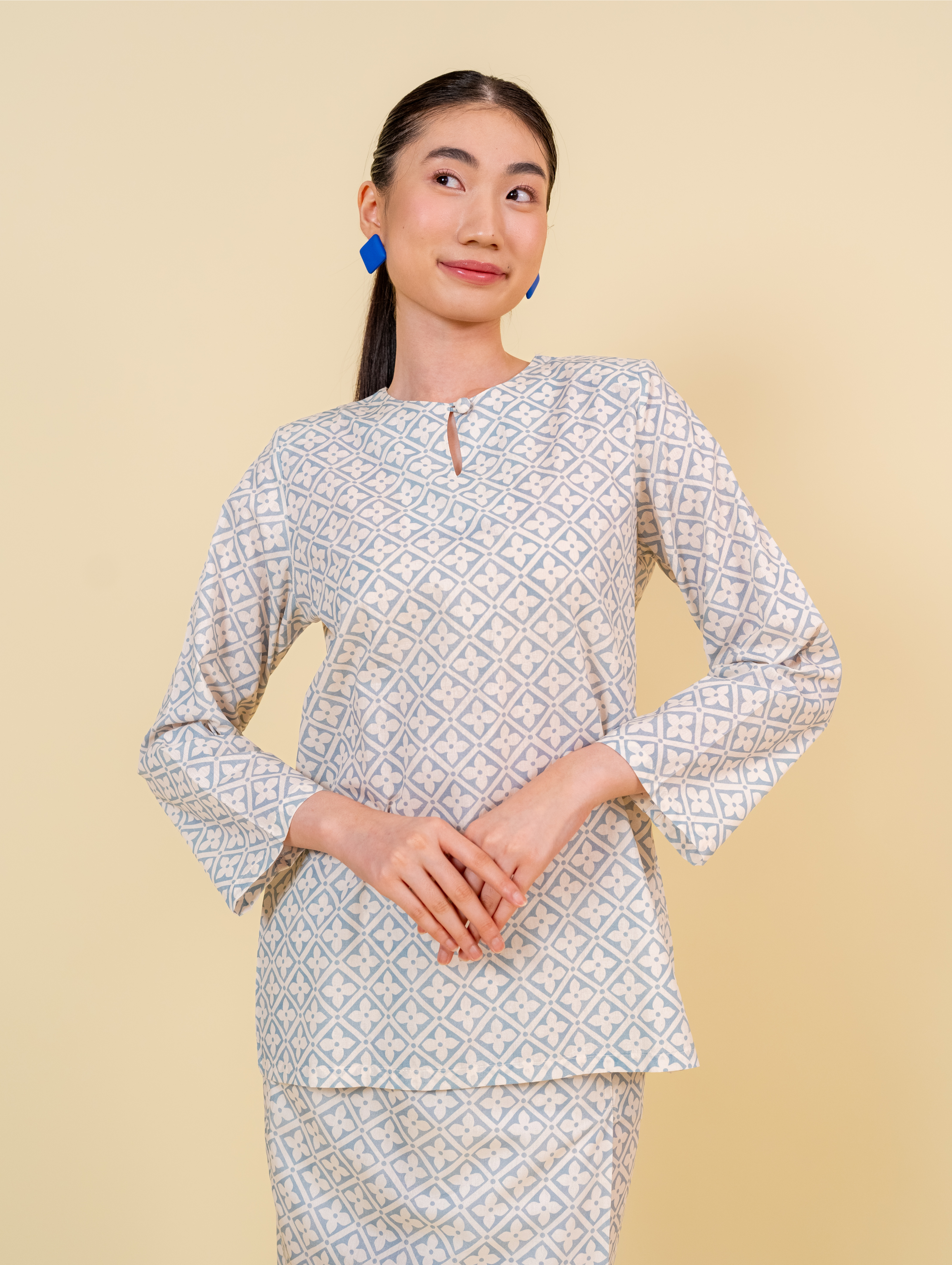 Natura Kurung in Cream